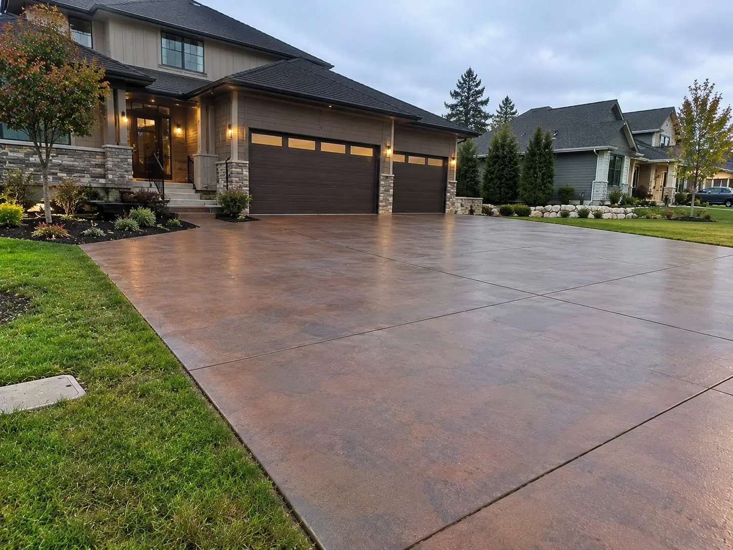 Finished concrete driveway at a home in Mount Ousley, near Wollongong
