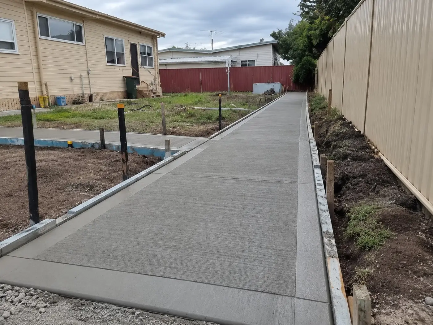 New concrete side path running along a Wollongong home
