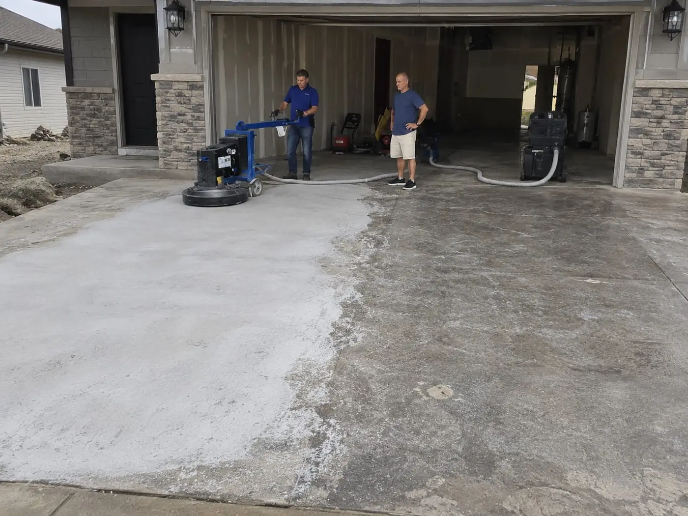 Diamond grinder working across a concrete floor in a Wollongong property