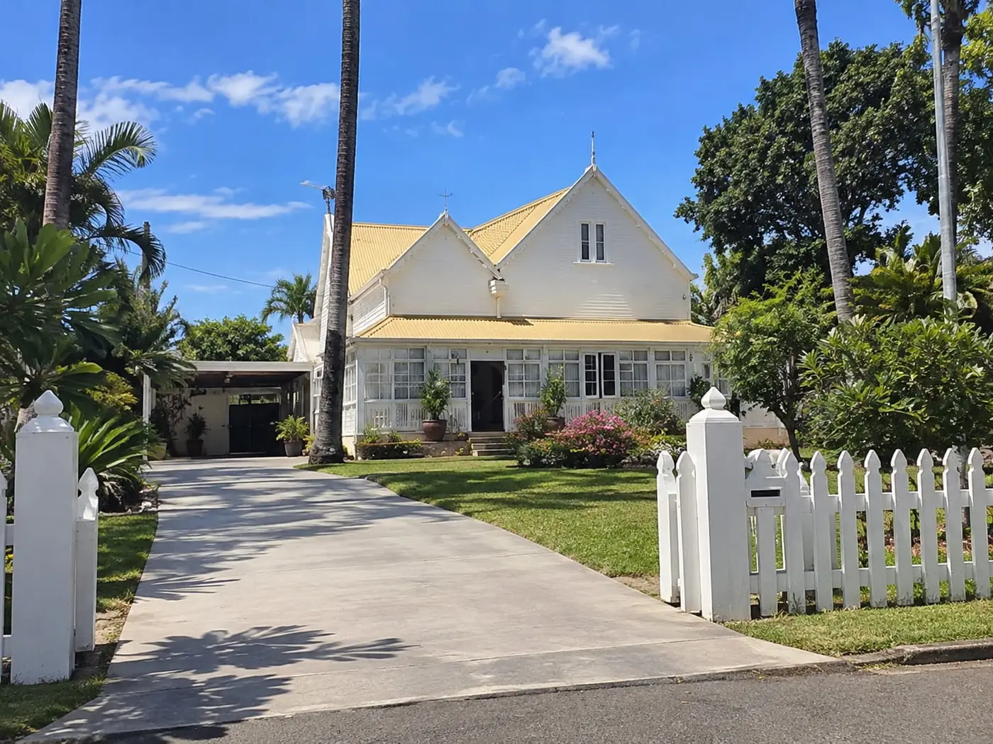 Plain grey concrete driveway at a Wollongong home