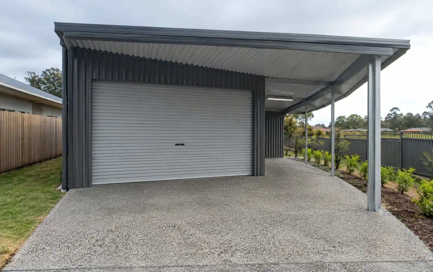 Concrete slab under a steel shed and carport in Wollongong
